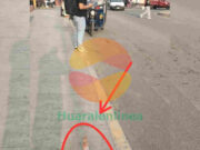 Peatones en riesgo por señalización mal ubicado en la vía pública